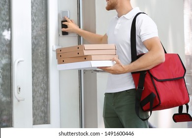 Worker Of Food Delivery Service Ringing The Doorbell