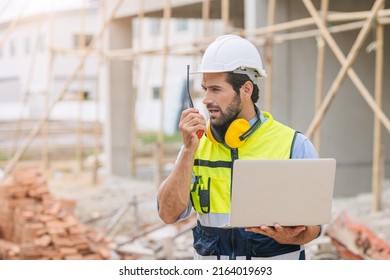 worker foreman engineer builder working using radio command in home construction site safety check. - Shutterstock ID 2164019693