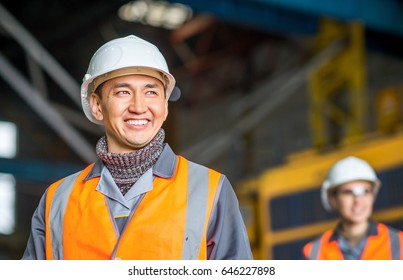 Worker In Front Of A Bug Truck