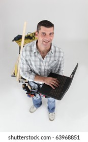Worker in front of a laptop computer