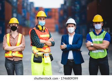 worker group with engineer, foreman, and manager are wearing medical protection face mask in industry working site, working measures to prevent the spread of the virus COVID-19 - Powered by Shutterstock