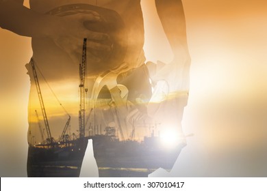 Worker Holding Tool With Twilight Time On Labor Day ,double Exposure
