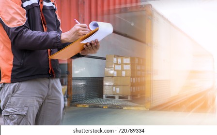 Worker Holds a Clipboard Checking the Loading Cargo Shipment at Distribution Warehouse. Forklift Loading Delivery to Customers. Package Boxes Supplies Warehouse. Freight Truck Logistics Transport  - Powered by Shutterstock