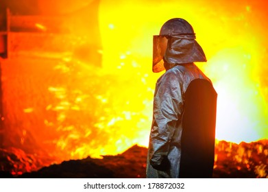 worker with hot steel - Powered by Shutterstock