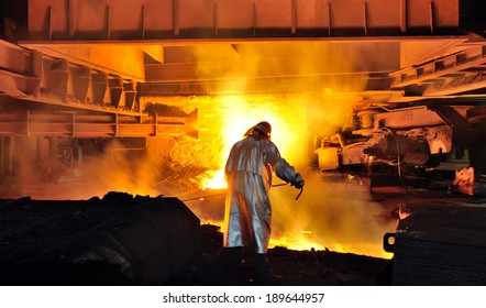 Worker With Hot Steel In Plant