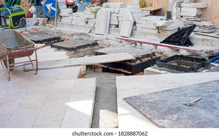 Worker Inserts Fiber Optic Cables Buried In A Micro Trench