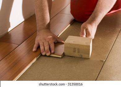 Worker Install A Hardwood Floor