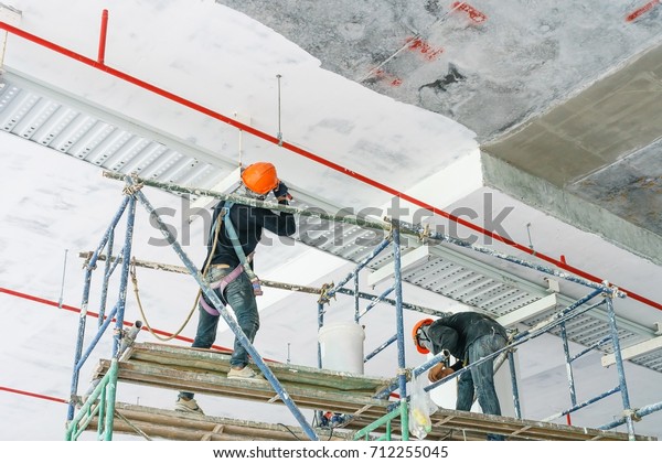 Worker Installing Cable Tray Electrical Wiring People