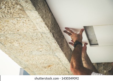 Worker Installing Polystyrene Insulation Boards. Energy Savings, Home Insulator