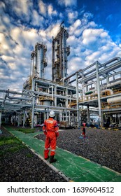 A Worker Is Looking At The Amine Tower On The Gas Plant