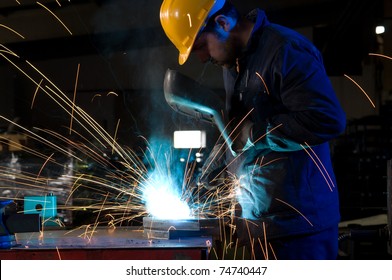 Worker Making Sparks While Welding Steel - A Series Of METAL INDUSTRY Images.