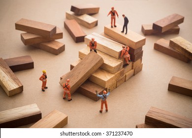 Worker Making Wood Step Stair. Success Building Concept.