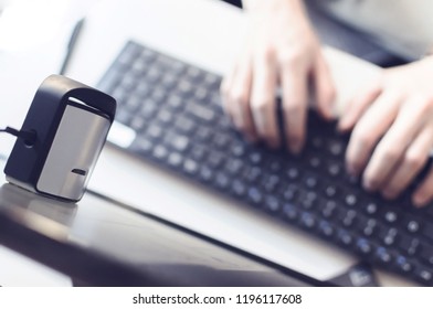 worker or male hands setting monitor calibration with spectrometer - Powered by Shutterstock