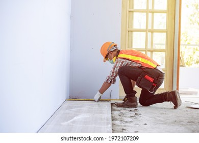 Worker Man With Safety Helmet Construction Building Industry, New Home, Construction Interior Service Concepts - Selective Focus. Vintage Film Grain Filter Effect Styles