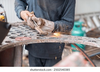 Worker metal Cutting With acetylene welding cutting torch in workshop. - Powered by Shutterstock