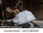 Worker at the old salt plant processing salted liquid in Drogobytch town in Ukraine