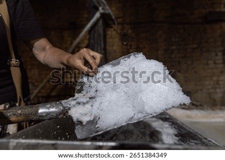 Worker at the old salt plant processing salted liquid in Drogobytch town in Ukraine