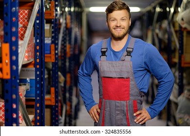 Worker On A Automotive Spare Parts Warehouse 