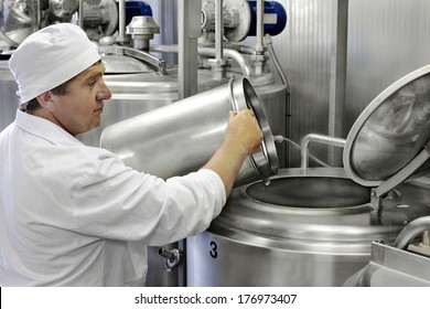 Worker On A Modern Milk Factory