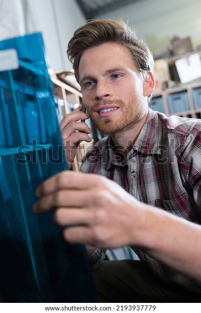 a worker on the\
phone