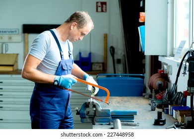 Worker On Work Bench