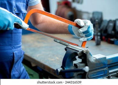  Worker On Work Bench In The Factory