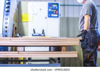 Worker Operating Machine In Wood Processing Factory