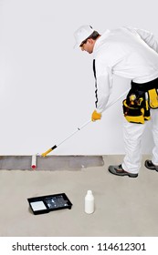 Worker Paint With Primer Concrete Floor For Waterproofing