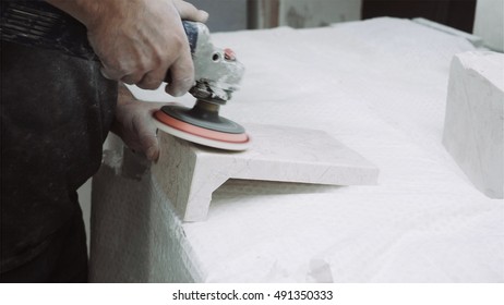 Worker Polishes The Piece Of Marble Stone With Tools, Close Up