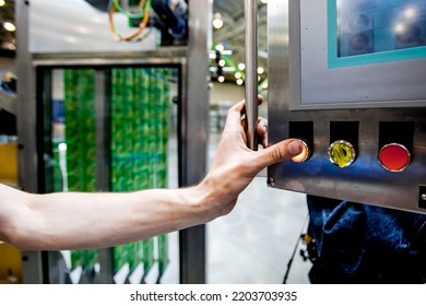 Worker Press Start Button On Equipment On Beverage Factory. Industrial Drink Production