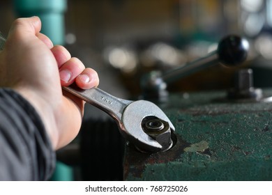worker press start button on panel control for start CNC machine