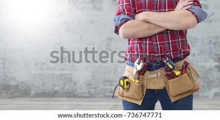 worker and professional builder with tools