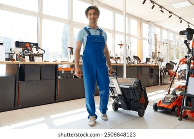 Worker purchasing industrial tools kit at hardware store department - Powered by Shutterstock