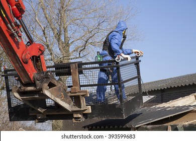 Worker Removing Asbestos