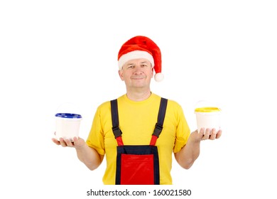 Worker in santa hat with two buckets. Isolated on a white background.
