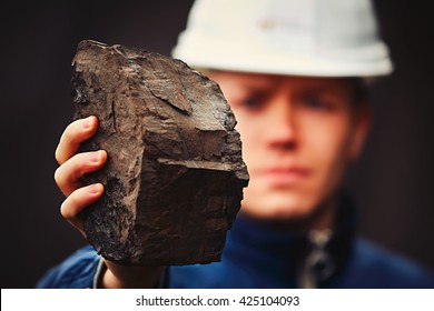 Worker Is Showing Lignite - Often Referred To As Brown Coal