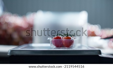 Similar – Image, Stock Photo Hand with cherry on purple background with copy space