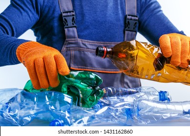 Worker Sorting Plastic Garbage For Recycling. Process Plastic Polymers Sorting. Ecology. Concept