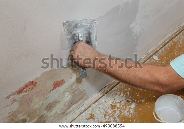 plaster wall repair after flood