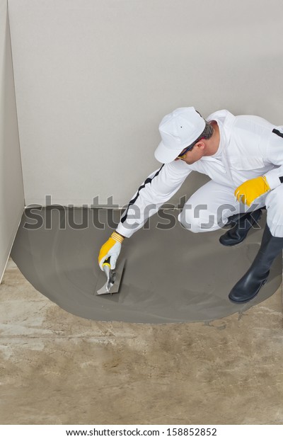 Worker Spreading Self Leveling Compound Trowel Stock Photo Edit