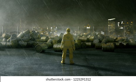 Worker Stands In Front Of Barrels Of Nuclear Waste