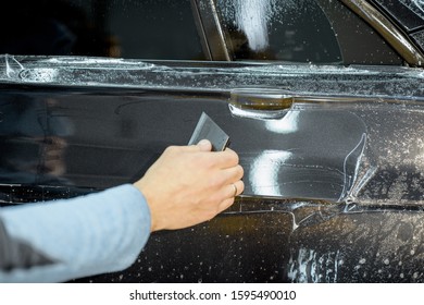 Worker Sticking Antigravel Film On Car Stock Photo 1595490010 ...