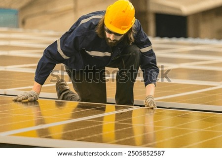 Worker Technicians are working to construct solar panels system on roof. Installing solar photovoltaic panel system. Men technicians walking on roof structure to check photovoltaic solar modules.