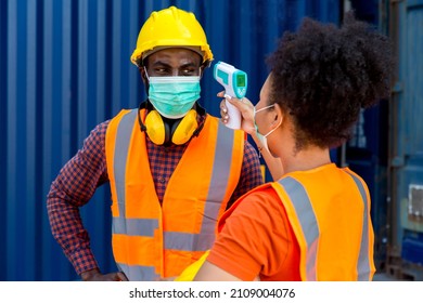 Worker Temperature Screening And Medical Check At Container Cargo Site.