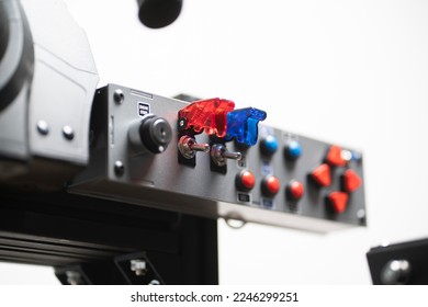 worker turning on the toggle switch up, industrial power control panel