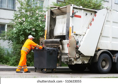 Worker of urban municipal recycling garbage collector truck loading waste and trash bin - Shutterstock ID 510633055