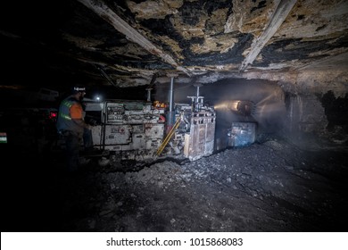 Worker Using Continuous Miner To Extract Coal Underground