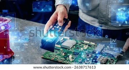 Worker using handheld terminal and digital technology concept