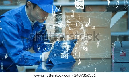 Worker using a tablet in a warehouse and communication network concept. IIoT. Industrial Internet of Things.