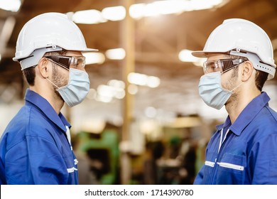 Worker Wear Face Mask Standing Distancing During Talking Together Service Working In Factory To Prevent Covid-19 Virus Air Dust Pollution And For Good Healthy.